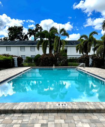 A swimming pool with a 3 feet depth sign.